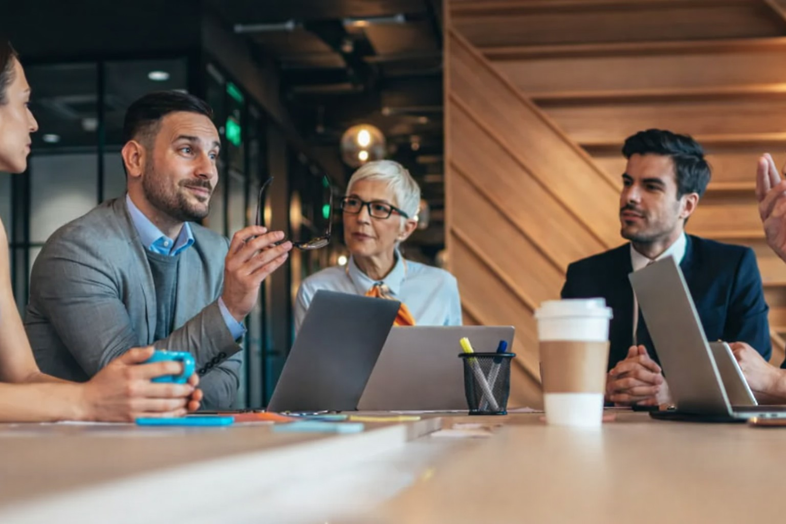 Construction leadership team reviewing IT strategy and provider performance