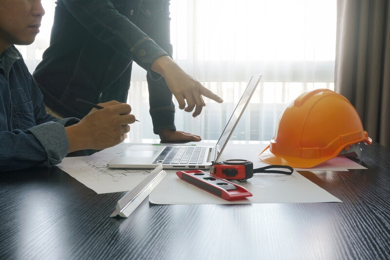 Construction office team using Microsoft 365 for collaboration