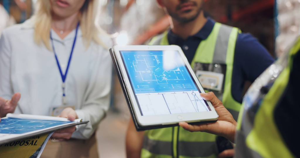Construction supervisor reviewing digital project dashboard
