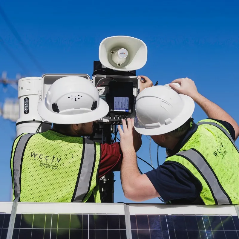 IT technician assisting construction workers on-site in Southern California