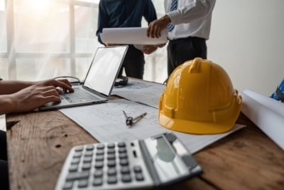 Construction company reviewing IT service agreement